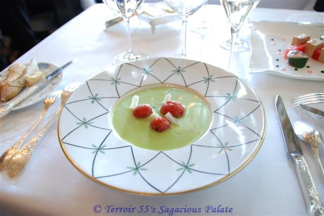 (Cold young French peas bouillon and ginger, glazed tomatoes with fresh goat cheese and smoked pork chest) Soup