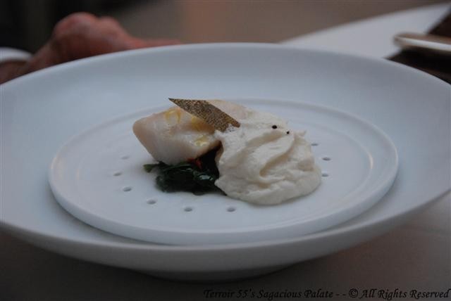Steamed black cod with spinach, sun dried tomato and whisky foam