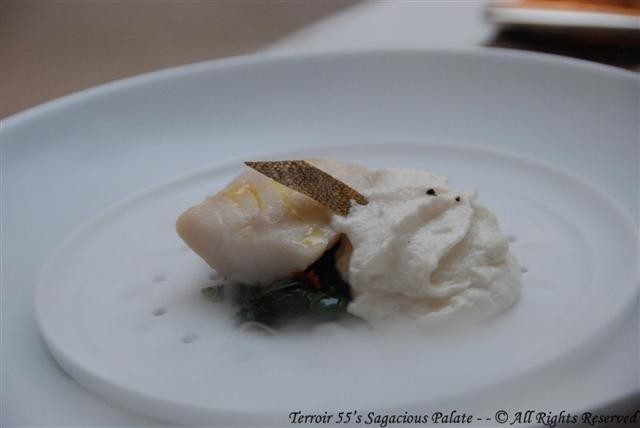 Steamed black cod with spinach, sun dried tomato and whisky foam