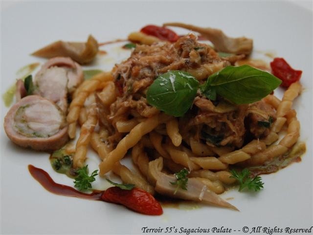 Handmade fusilli with rabbit genovese style, artichokes and pecorino cheese
