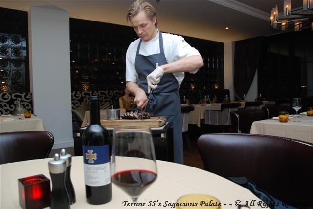Chef Esko cutting Rotisserie Lamb