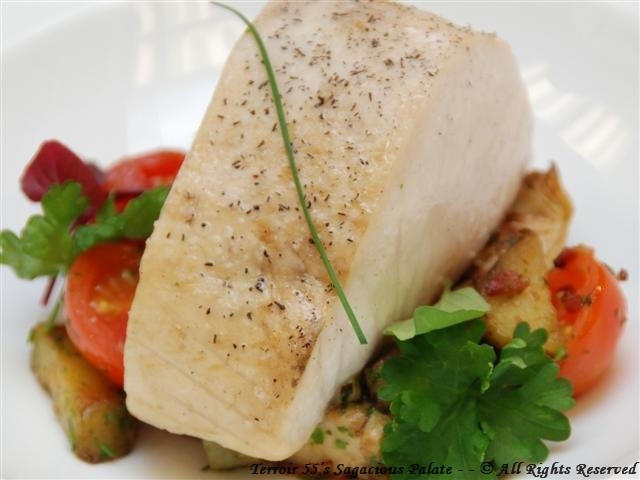 Hickory smoked Hawaiian Walu served over a tomato, artichoke and bacon ragout with parsley. Celery broth on the side.