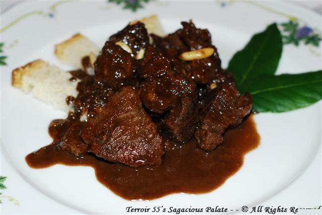 Cinghiale in Dolceforte (Wild boar in a typical Tuscan sauce prepared with vinegar, chocolate, raisins and pine nuts)