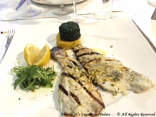 Grilled Branzino - with fresh lemon and herbs. Side of arugula, sauteed spinach and polenta.
