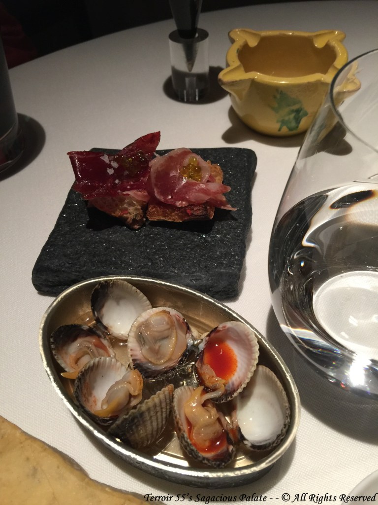 Baby clams with secret sauce #3 & grilled coca bread with Iberian jamón
