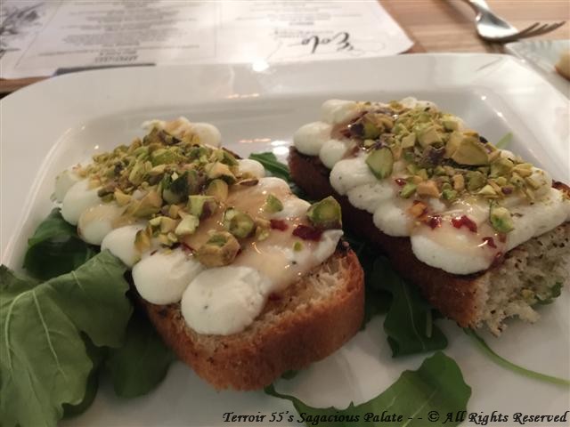 Bruschetta Con Ricotta (Grilled Focaccia topped with Homemade Ricotta, Spicy Pepper infused Honey & Crumbled Pistachios
