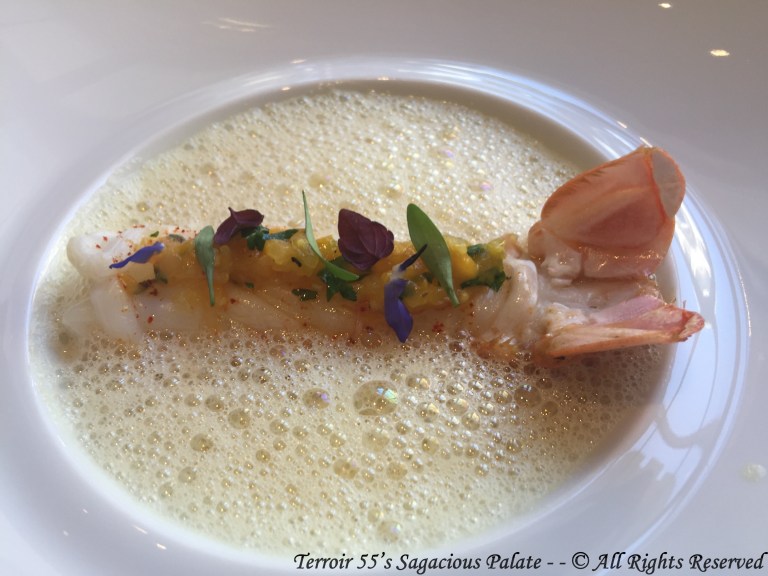 Large Langoustines Lightly cooked with lemon-thyme, “onion-mango” condiment, broth of the claw with citrus fruit and coriander